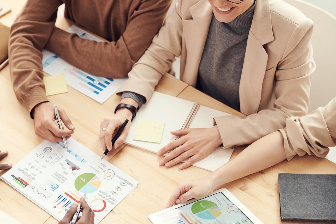 Business professionals analyzing franchise ROI and growth data