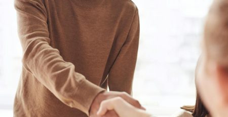 Professional reviewing semi-absentee franchise business strategy and financial planning